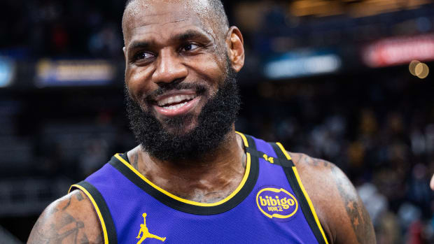 LeBron James walks off the court.