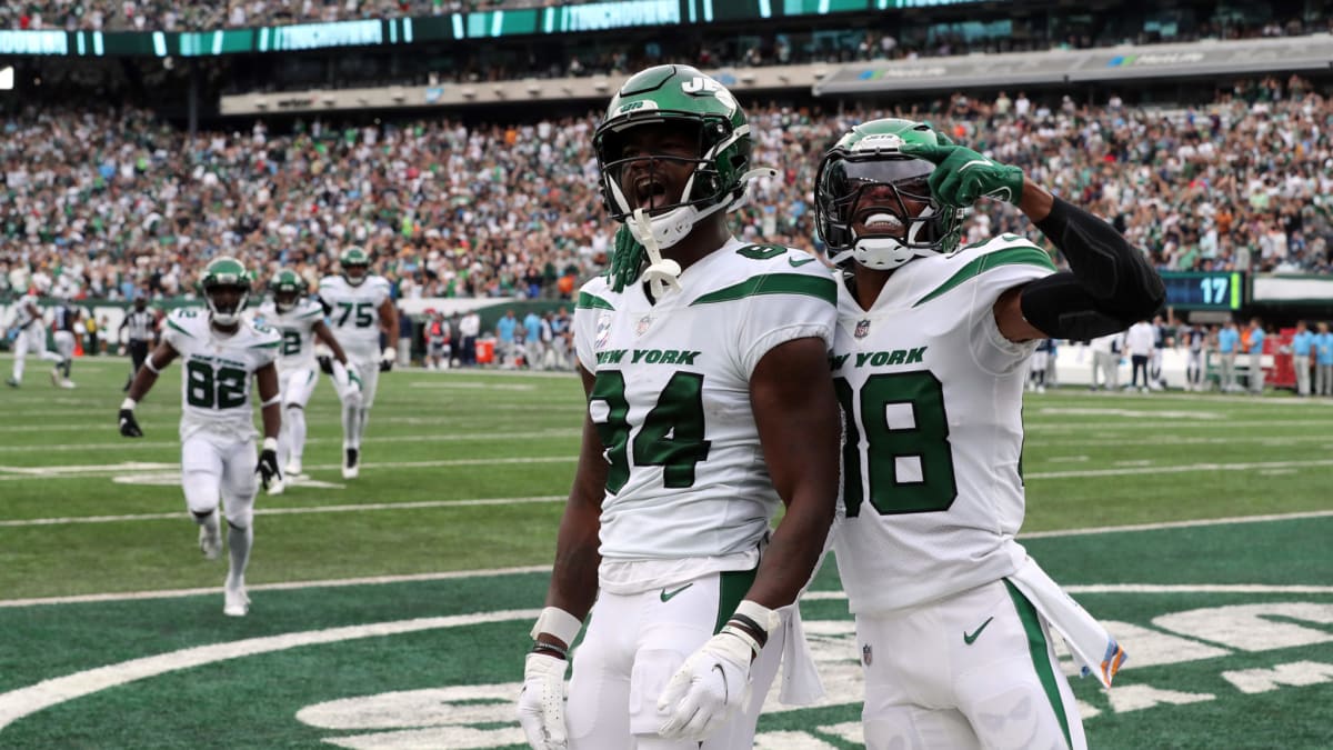 New York Jets wide receiver Corey Davis (84) celebrates after scoring a  touchdown against Tenne …