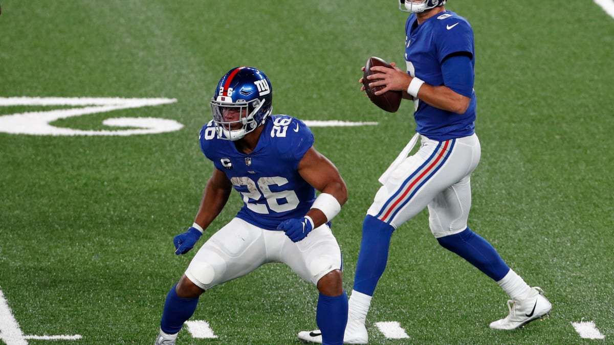 Giants' Saquon Barkley praises Daniel Jones after taking snaps vs Bears:  'He's a tough you know what