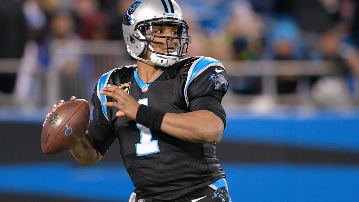 Cam Newton wearing the Nike Pepperjack Lows for today's press conference