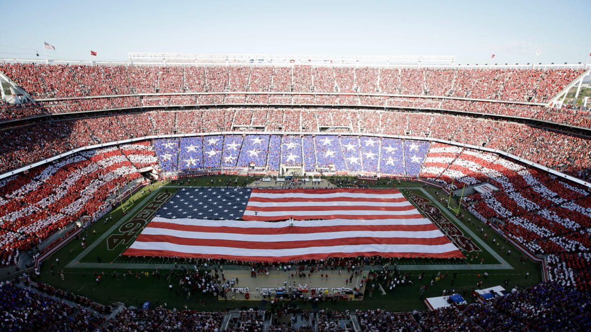 A flag is presented on the field of Levi's Stadium during the