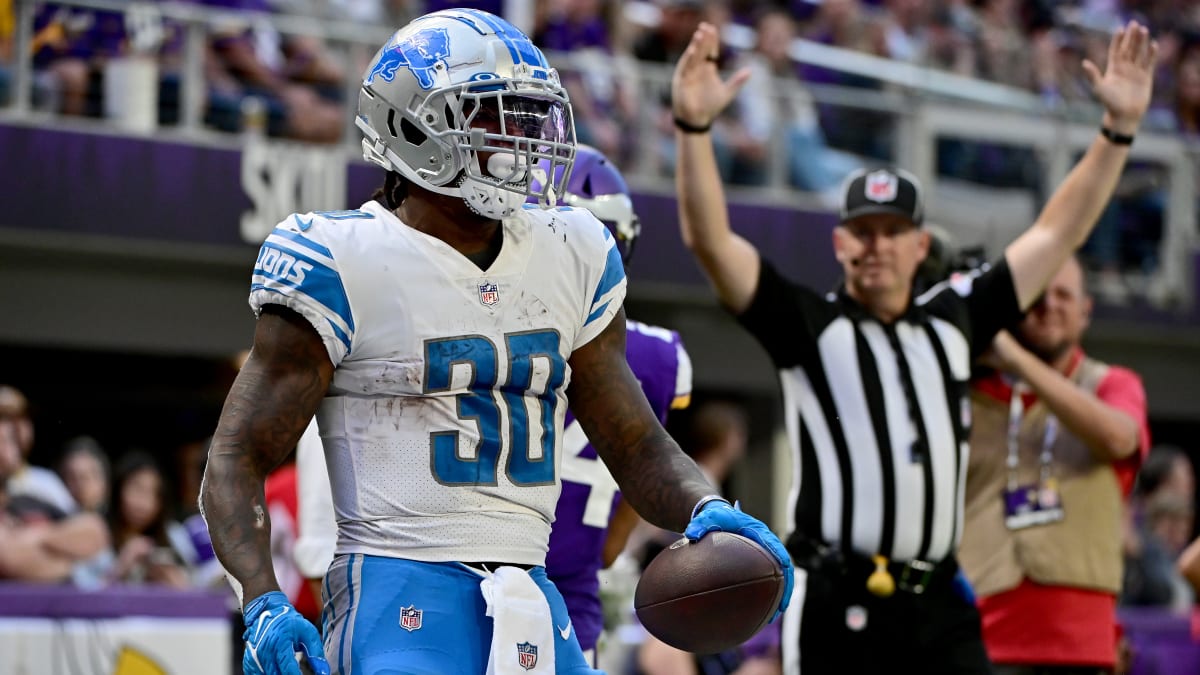 Detroit Lions running back Jamaal Williams walks onto the field