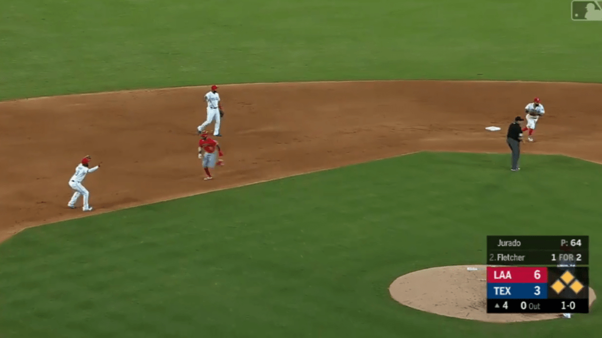 Rougned Odor makes diving stop in second start at third base for