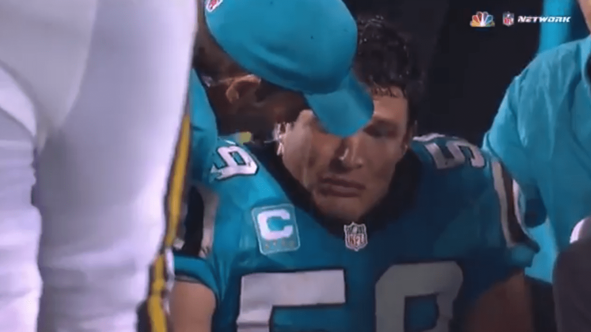 Carolina Panthers' Luke Kuechly #59 walks off the field against