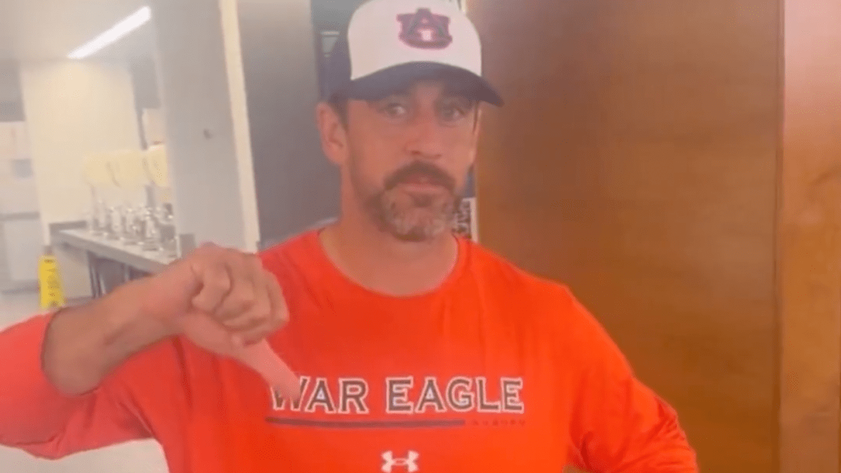 Aaron Rodgers Pays Up After Losing College Football Bet To Teammate - The  Spun: What's Trending In The Sports World Today