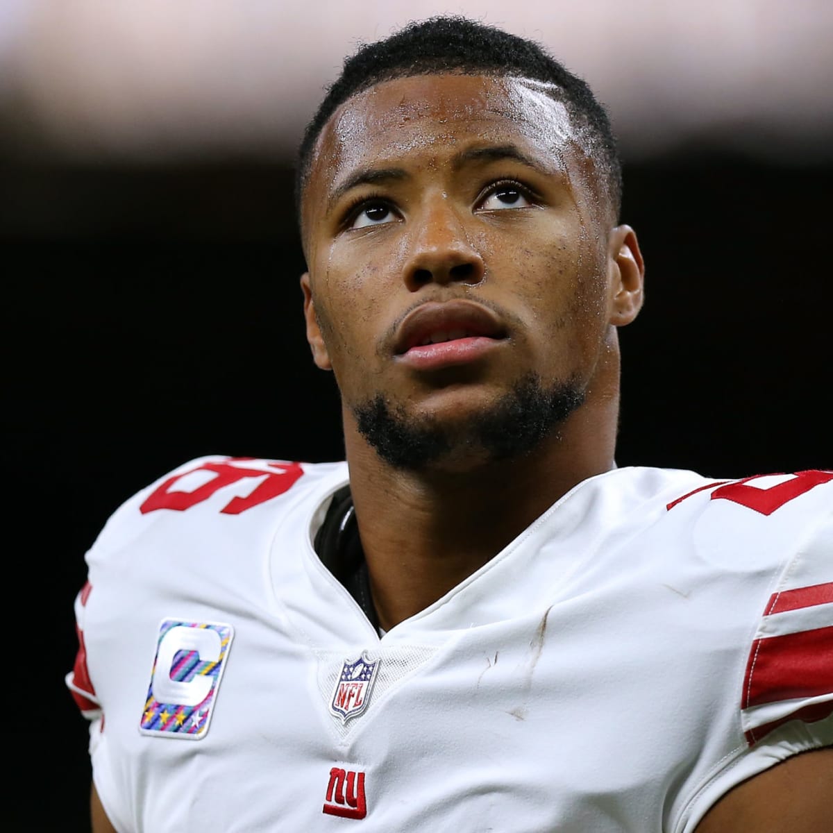 Somebody blinked: Giants' Saquon Barkley signs deal and reports to