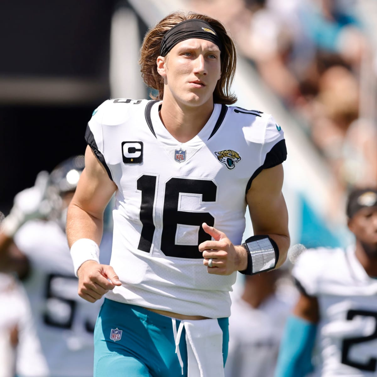 Jacksonville Jaguars quarterback Trevor Lawrence (16) watches a