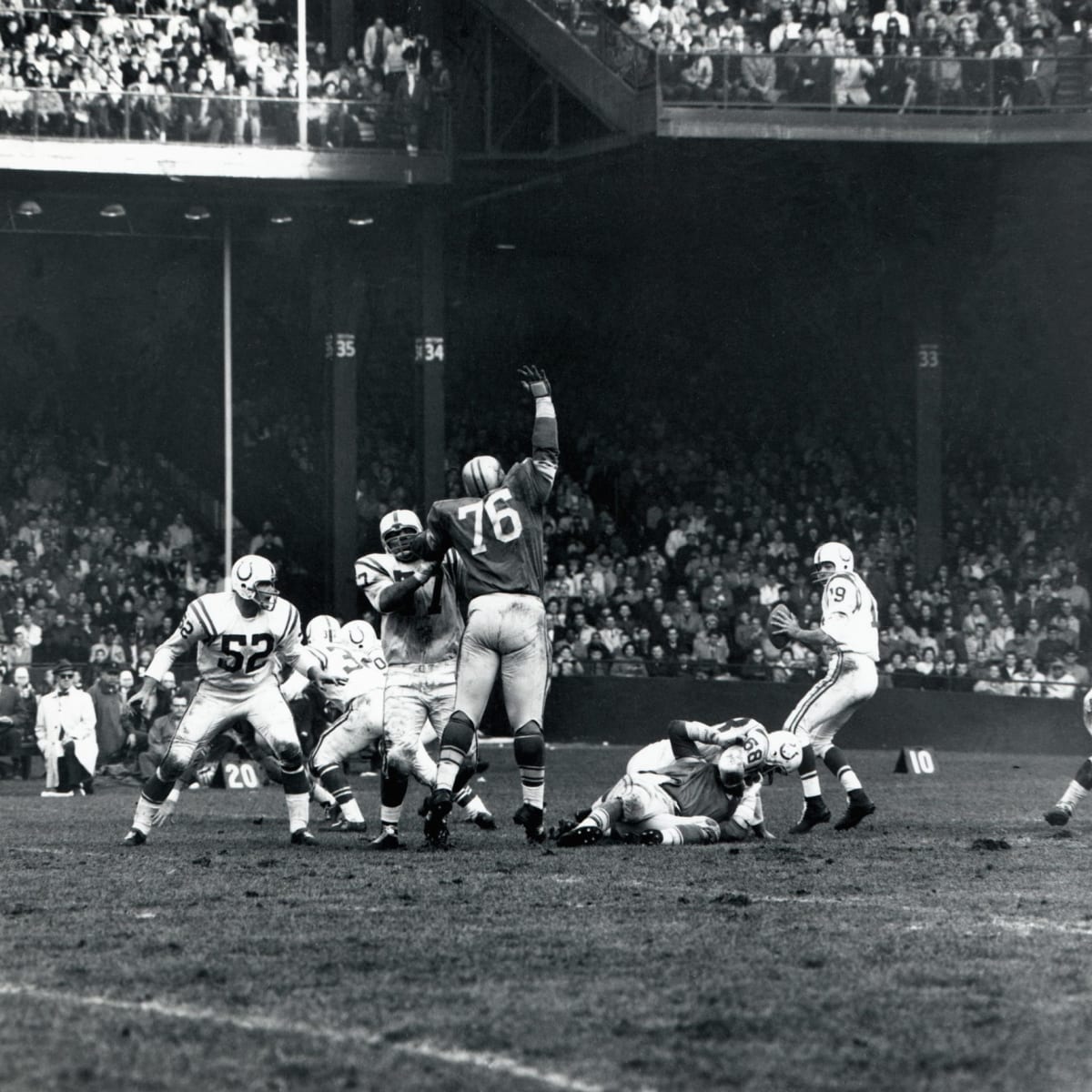 Baltimore Colts running back Bill Olds (38) is stopped at the line of  scrimmage by a team mate during action with the Steelers in Pittsburgh,  Dec. 27, 1975. (AP Photo Stock Photo - Alamy