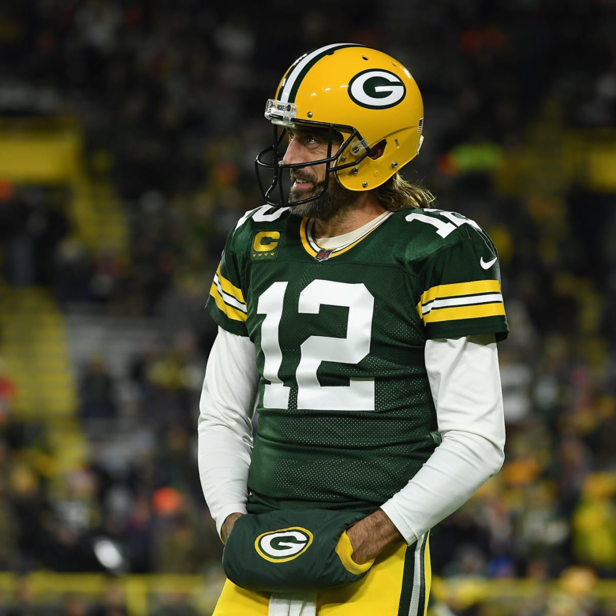 GREEN BAY, WI - OCTOBER 16: Green Bay Packers quarterback Aaron Rodgers  (12) passes during a game between the Green Bay Packers and the New York  Jets at Lambeau Field on October