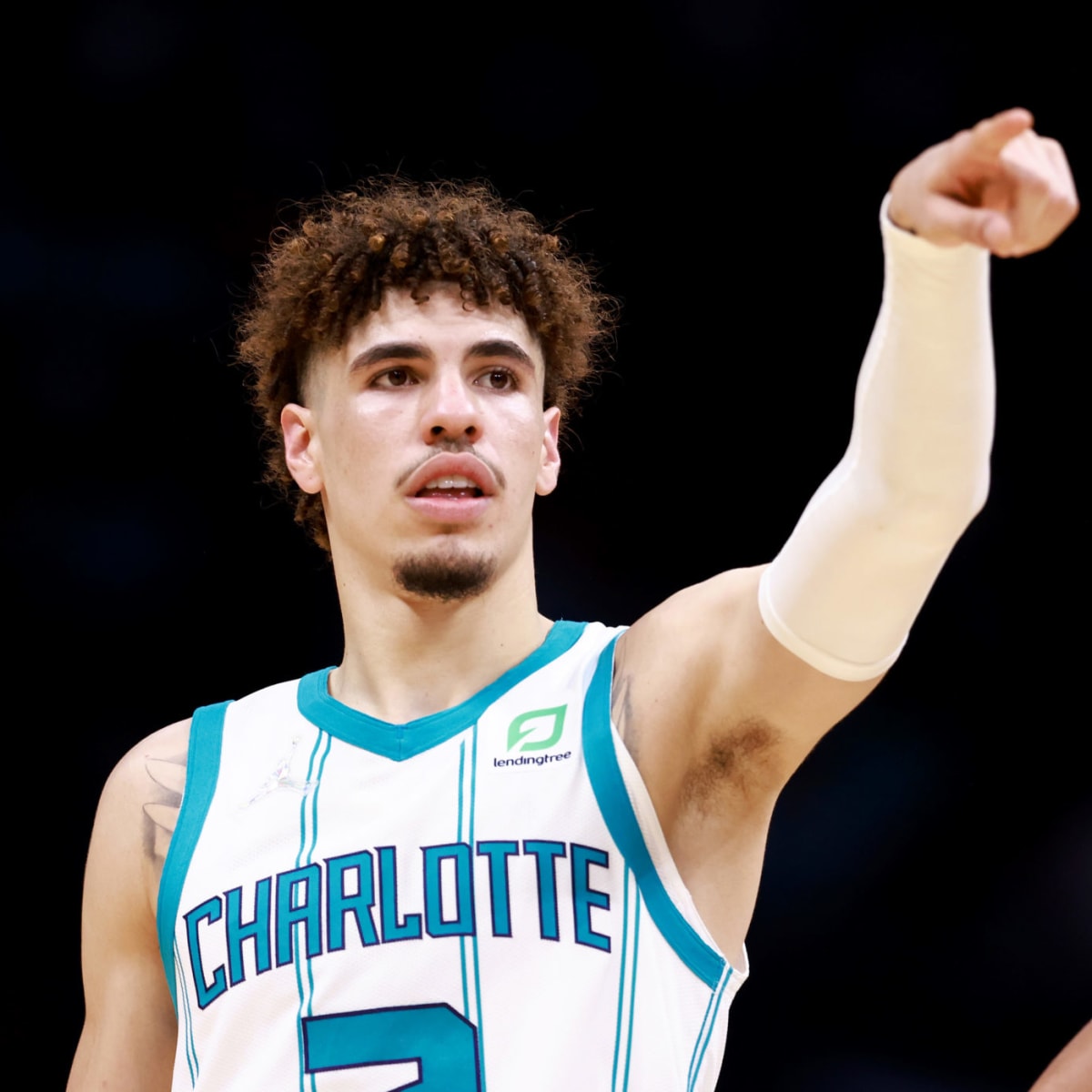 Did the NBA make LaMelo Ball cover his neck tattoo? Why Hornets star placed  band-aid over 'LaFrance' logo | Sporting News