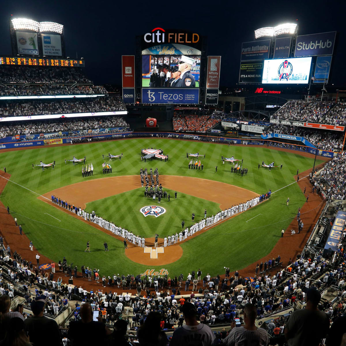 NEW YORK, NY - Wearing New York Mets jerseys, service members from the Air  Force, Army, Marines and Navy play a tournament style softball game at  Citifield on June 11, 2015. The
