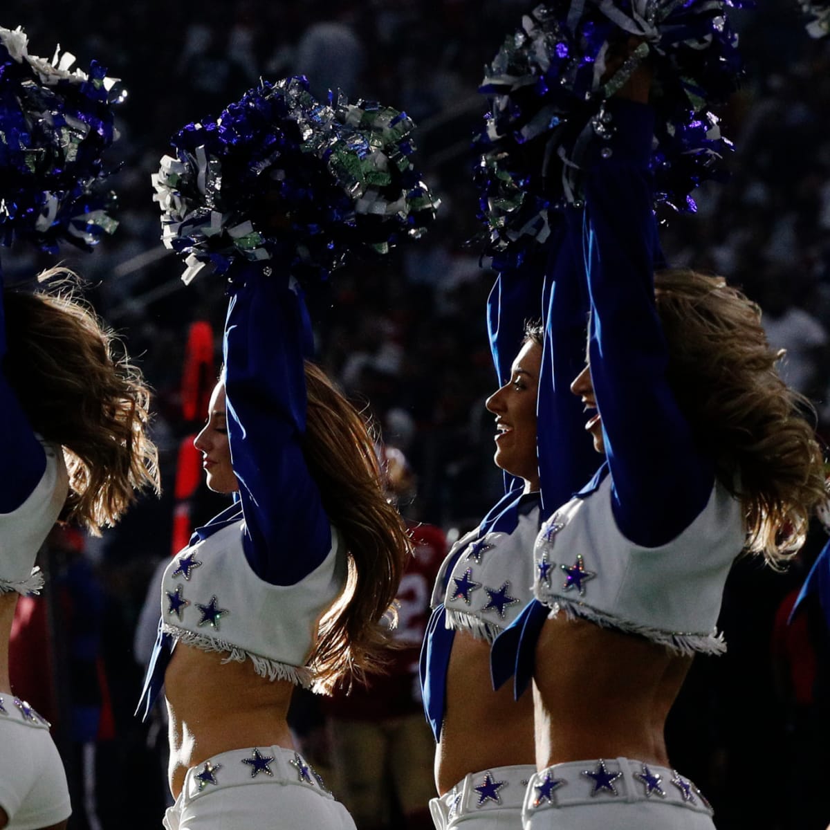 NFL fans on the Dallas Cowboys cheerleaders at WrestleMania 38