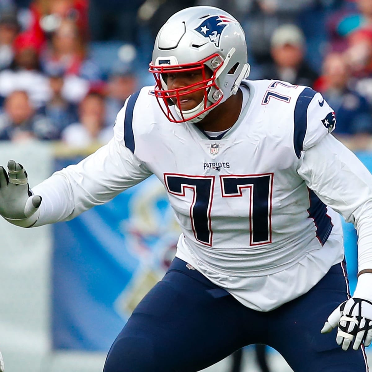 New England Patriots offensive tackle Trent Brown (77) reacts during the  first half of an NFL pre-season football game against the Houston Texans,  Thursday, Aug. 10, 2023, in Foxborough, Mass. (AP Photo/Greg