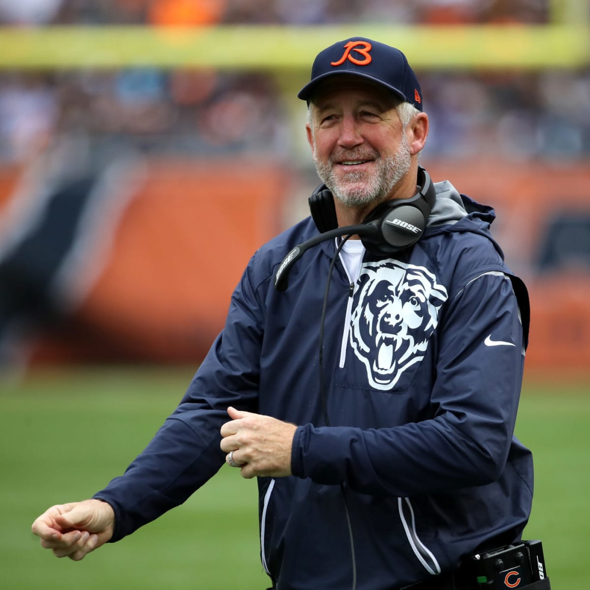 Carolina Panthers coach John Fox, left, helps draft choice Julius