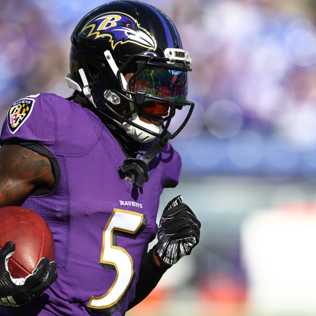 Marquise Brown of the Baltimore Ravens runs with the ball during the