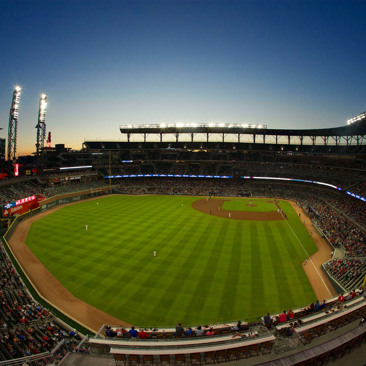 MLB teams crowding together during rain delays