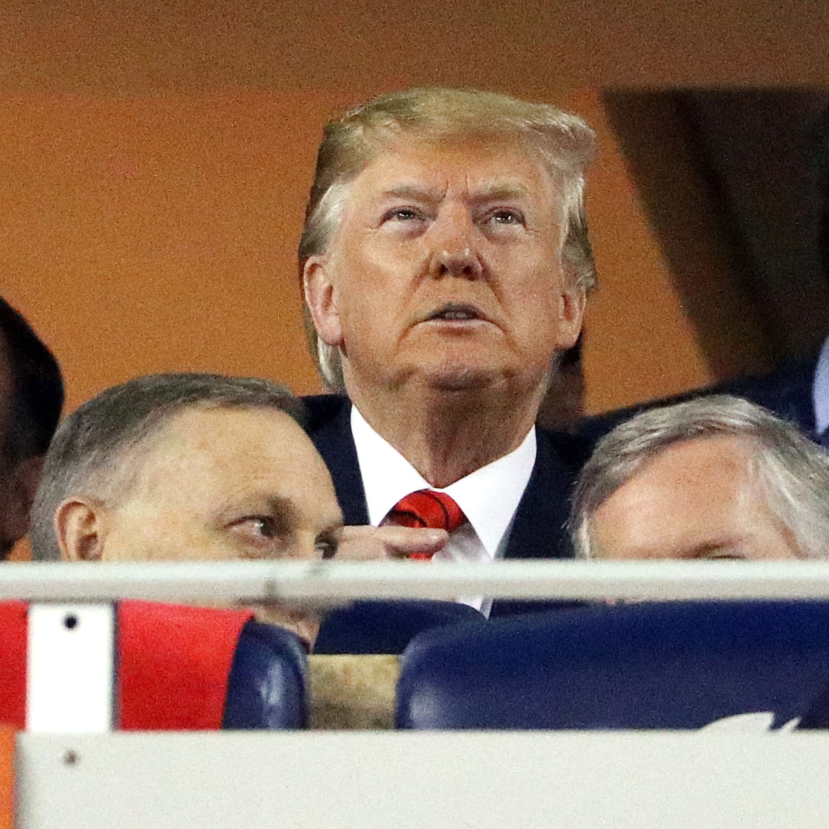 Washington, United States. 04th Nov, 2019. President Donald Trump reacts as  Washington Nationals catcher Kurt Suzuki wears a Make America Great Again  hat as President Donald Trump welcomes the 2019 World Series