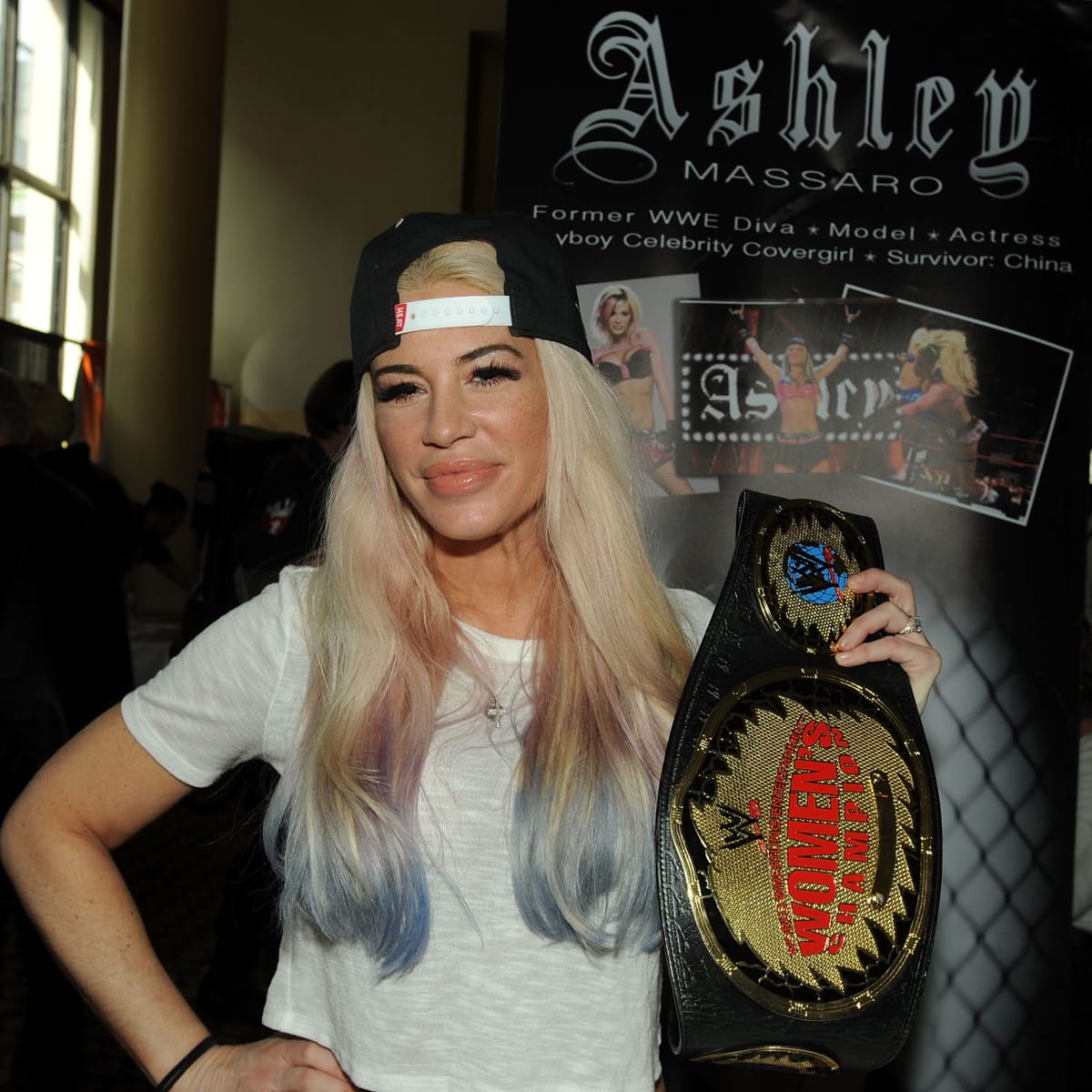 Cause Of Death Reported For WWE Star Ashley Massaro - The Spun