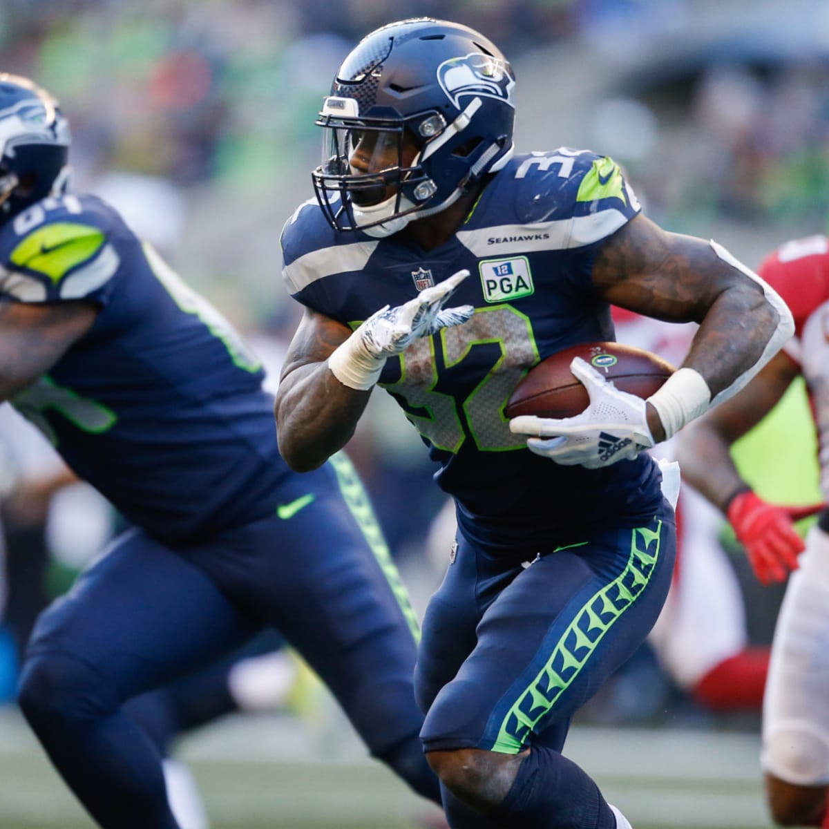 Seattle Seahawks running back Chris Carson gestures while smiling after an  NFL football game against the Dallas Cowboys, Sunday, Sept. 27, 2020, in  Seattle. The Seahawks won 38-31. (AP Photo/Stephen Brashear Stock