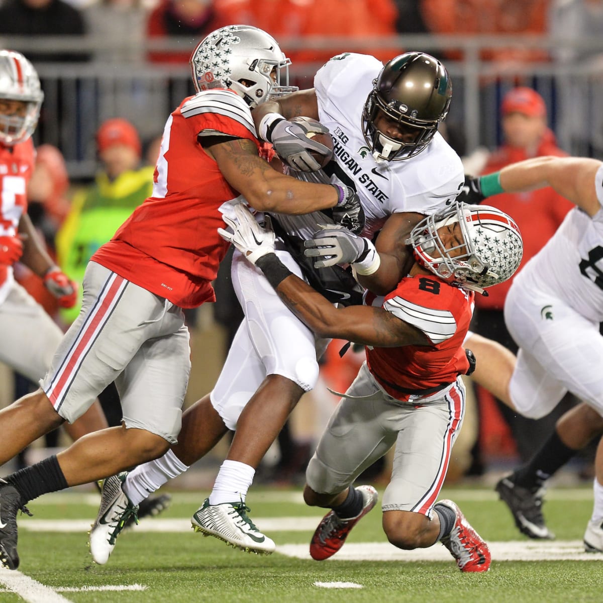 Experts pick Ohio State, Michigan State winner on ESPN 'College