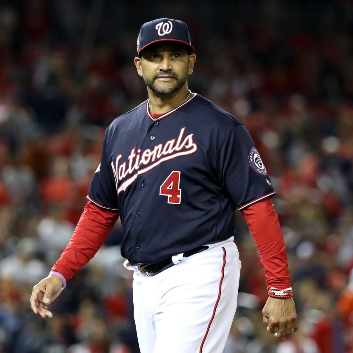 Manager Dave Martinez of the Washington Nationals looks on against News  Photo - Getty Images