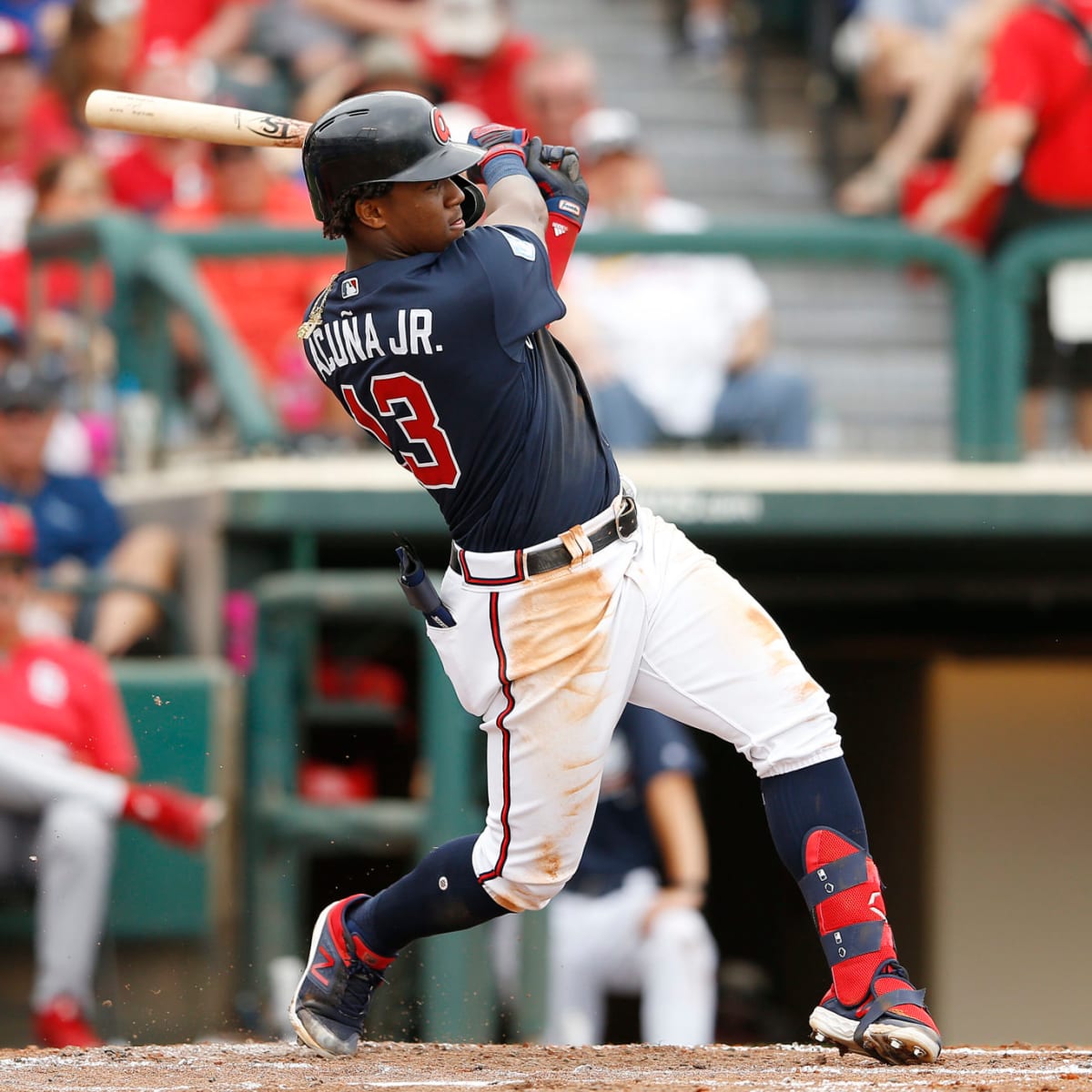 Ronald Acuna Jr. #13 of the Atlanta Braves hits a home run in the