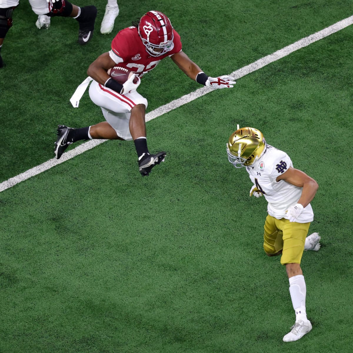 Najee Harris hurdles over Notre Dame defender in Rose Bowl after Megan  Rapinoe tells him to