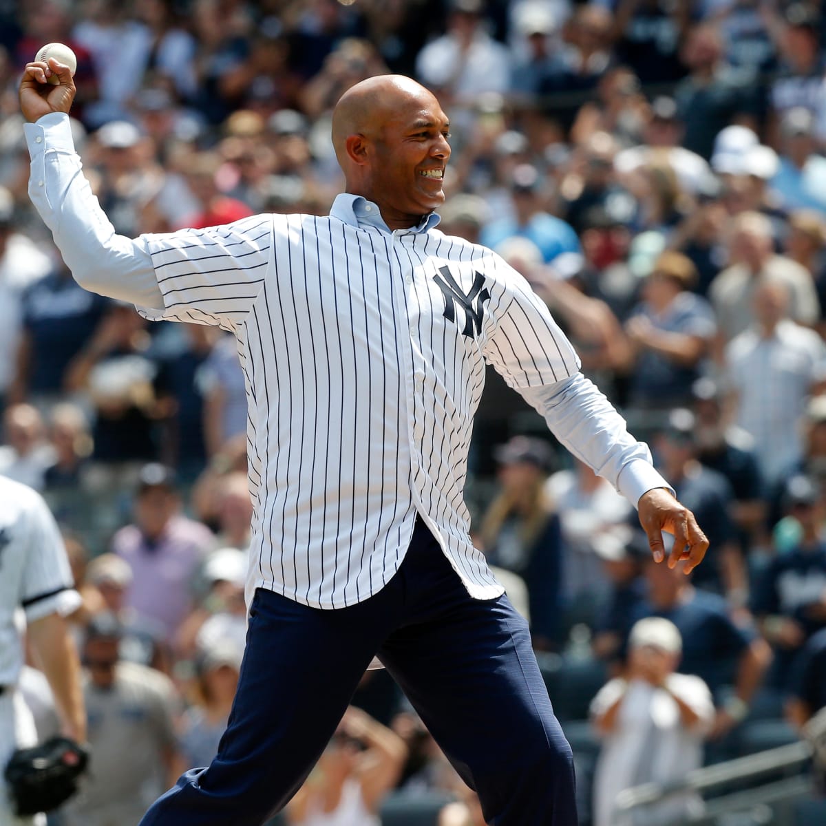 New York Yankees closer Mariano Rivera throws to first base in the 9th  inning against the San Francisco Giants at Yankee Stadium in New York City  on September 22, 2013. Rivera's hall