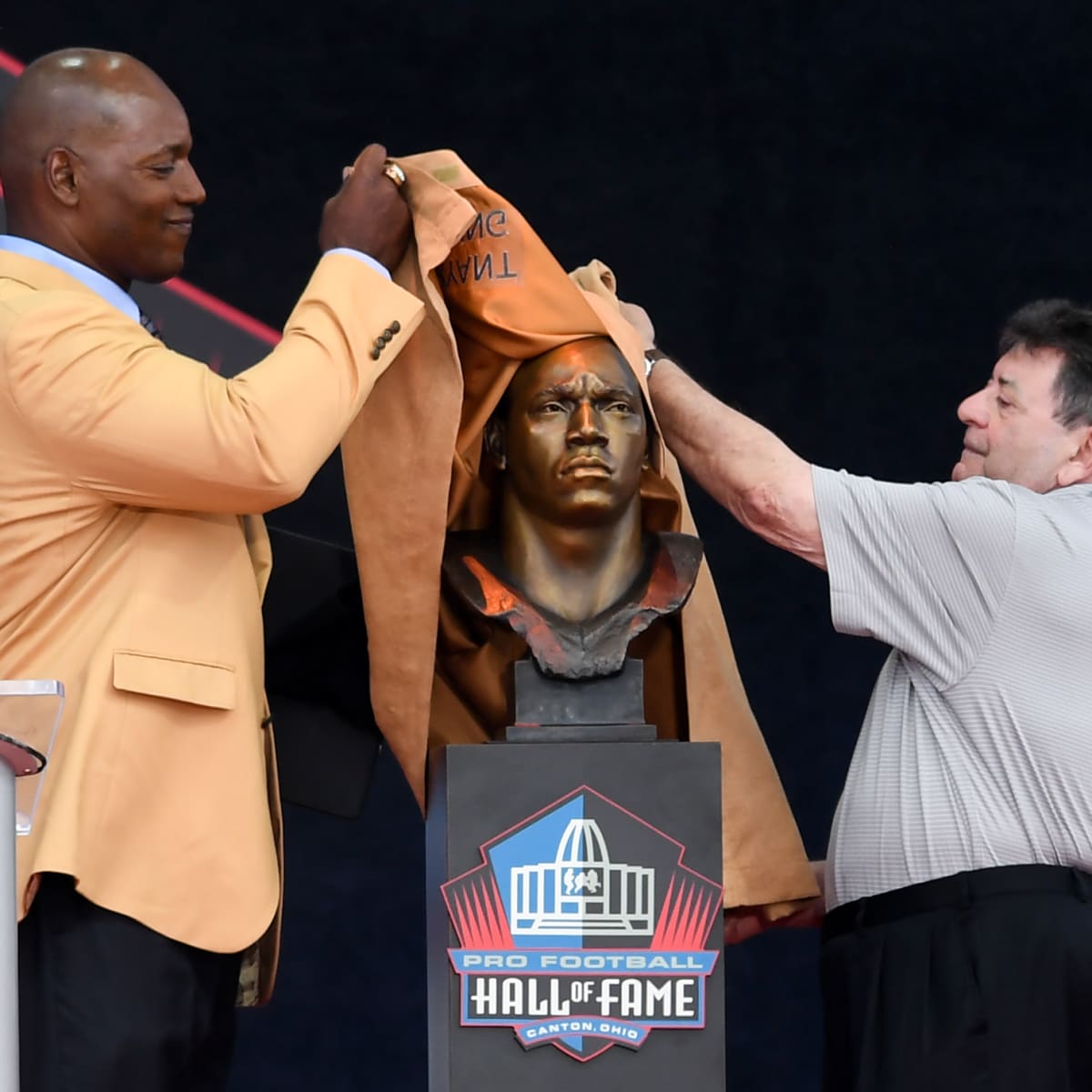 Former NFL player Bryant Young poses with his bust during an induction  ceremony at the Pro Football Hall of Fame in Canton, Ohio, Saturday, Aug.  6, 2022. (AP Photo/David Dermer Stock Photo 