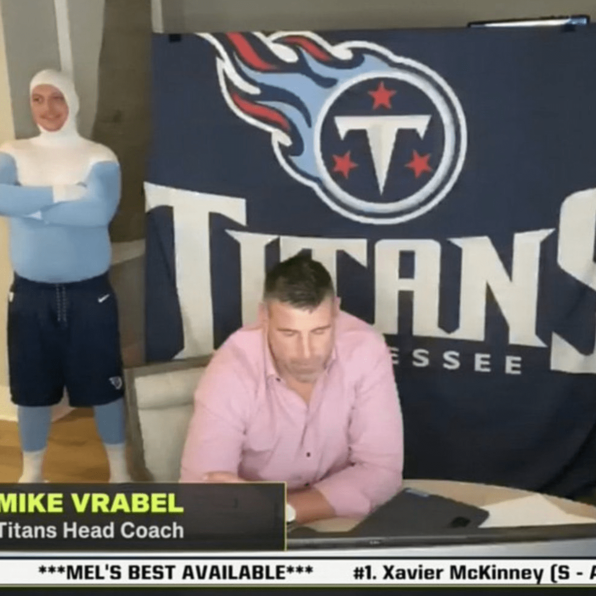 NFL Draft: Mike Vrabel's Titans war room goes viral, thanks to a mullet,  Frozone, kid in 'bathroom' 