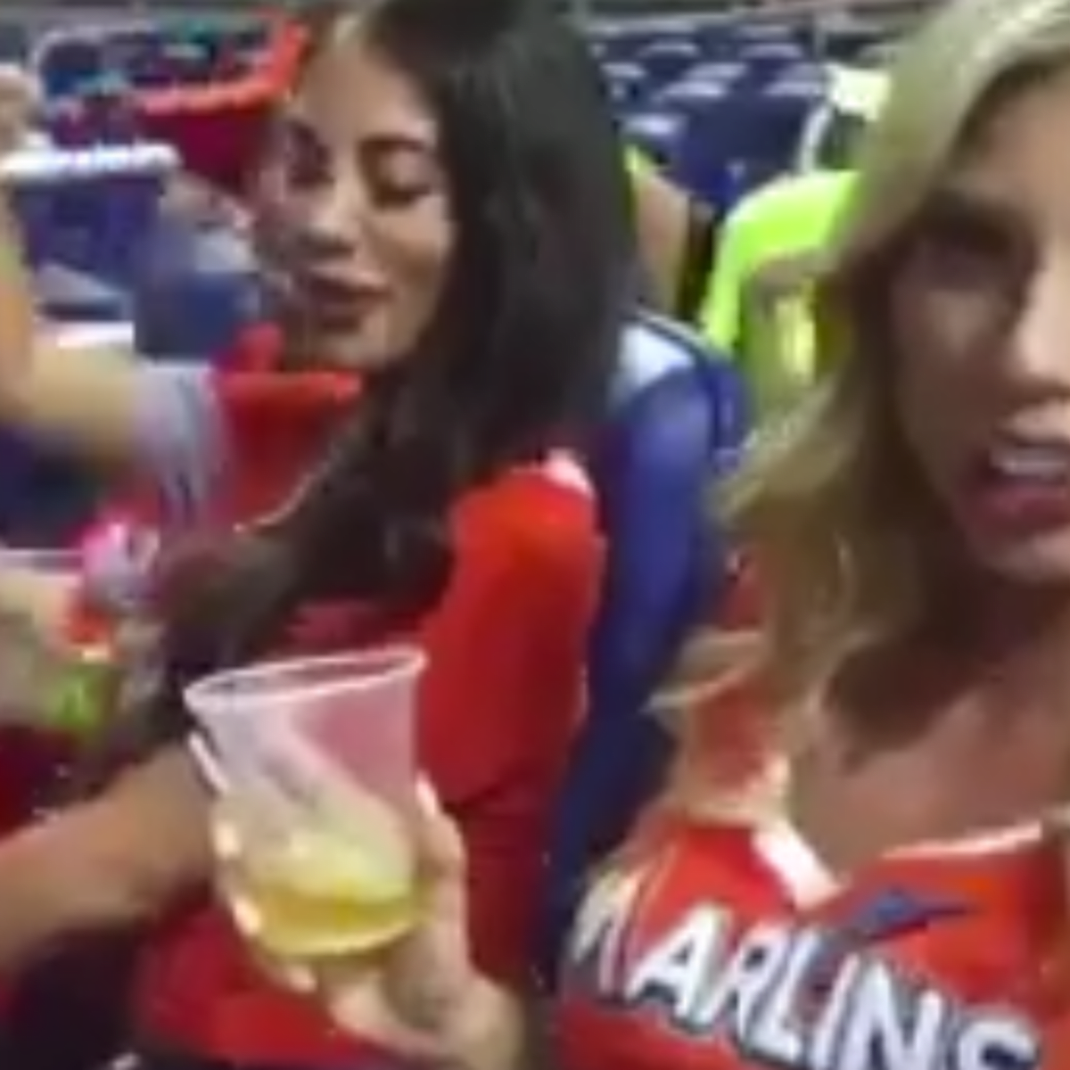 Miami Marlins fan flashes the camera on tv