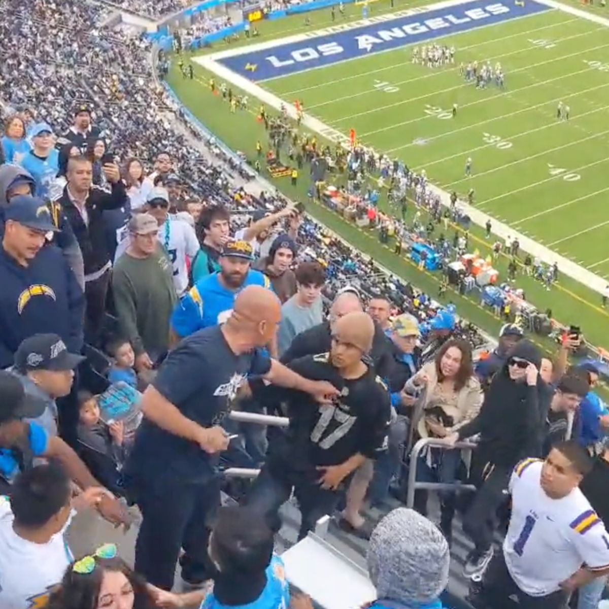 Titans fan dragged down steps in violent fight at Rams game