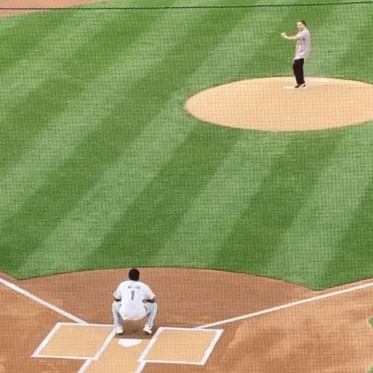 St. John's coach Rick Pitino throws out first pitch to Donovan