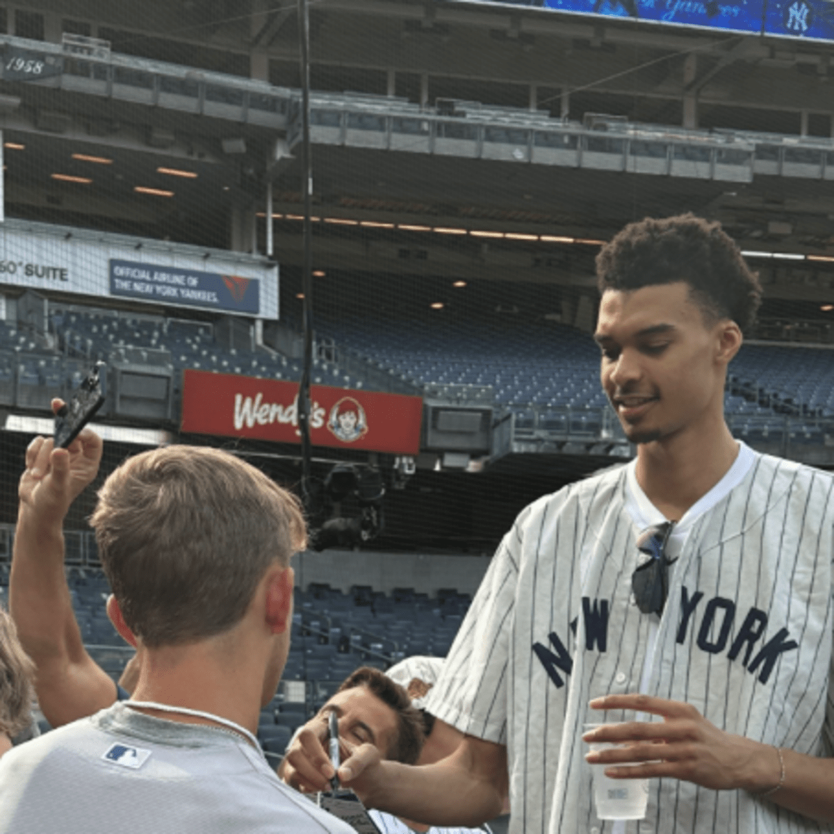 Victor Wembanyama throws the first pitch at Yankee Stadium, MLB on ESPN in  2023