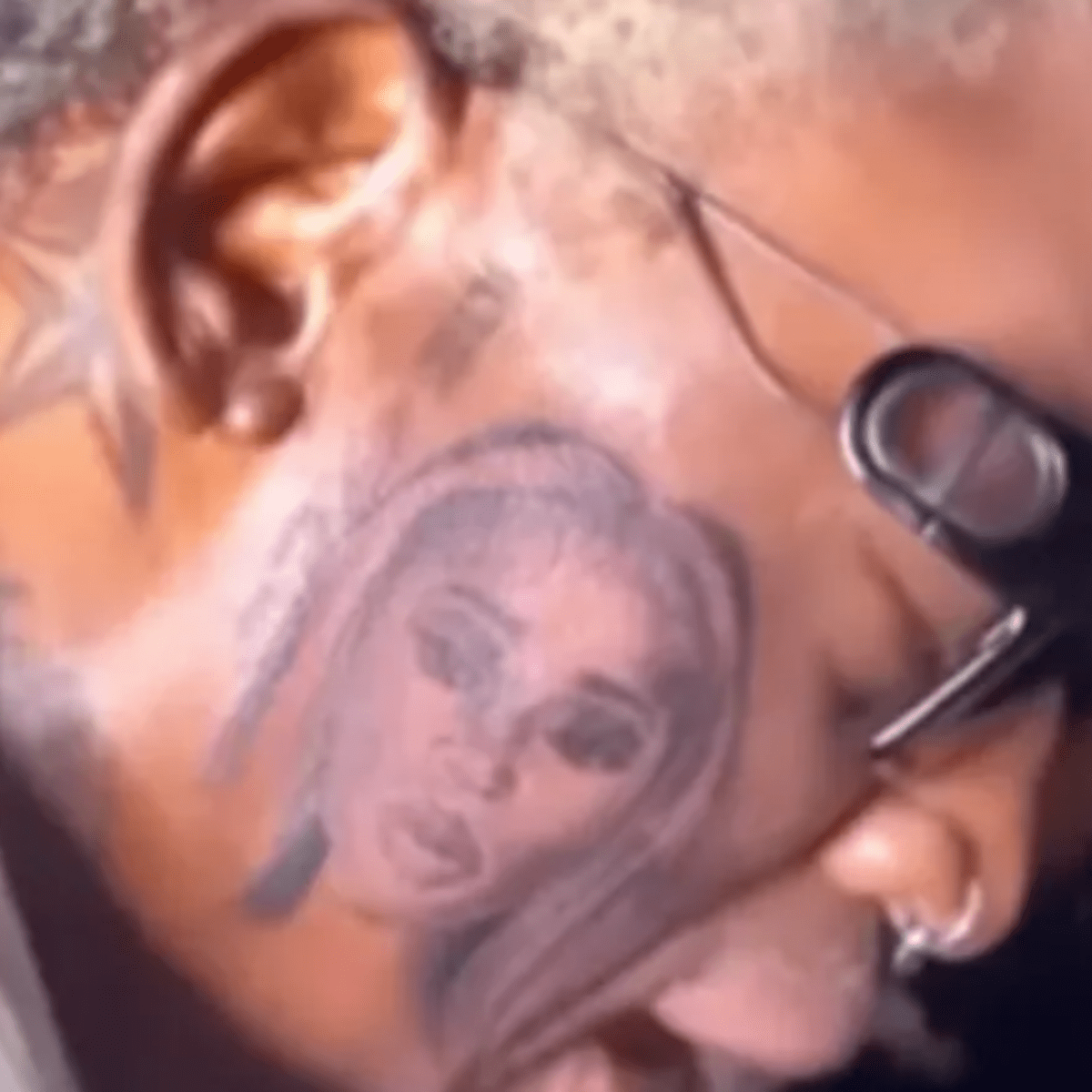 Dennis Rodman Gets Tattoo of His Face Next to Girlfriend Yella Yella's