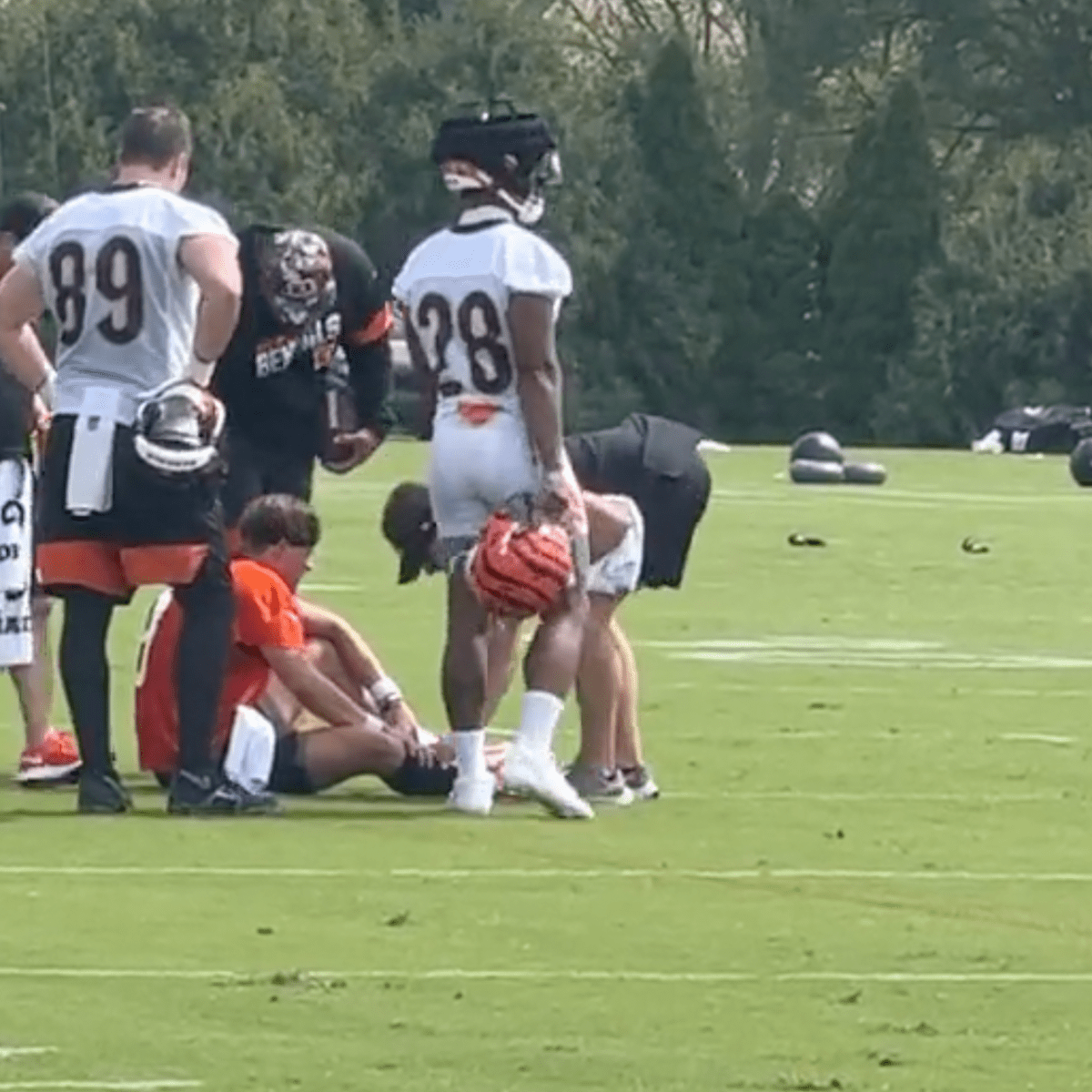 QB Joe Burrow carted off the field during Bengals practice