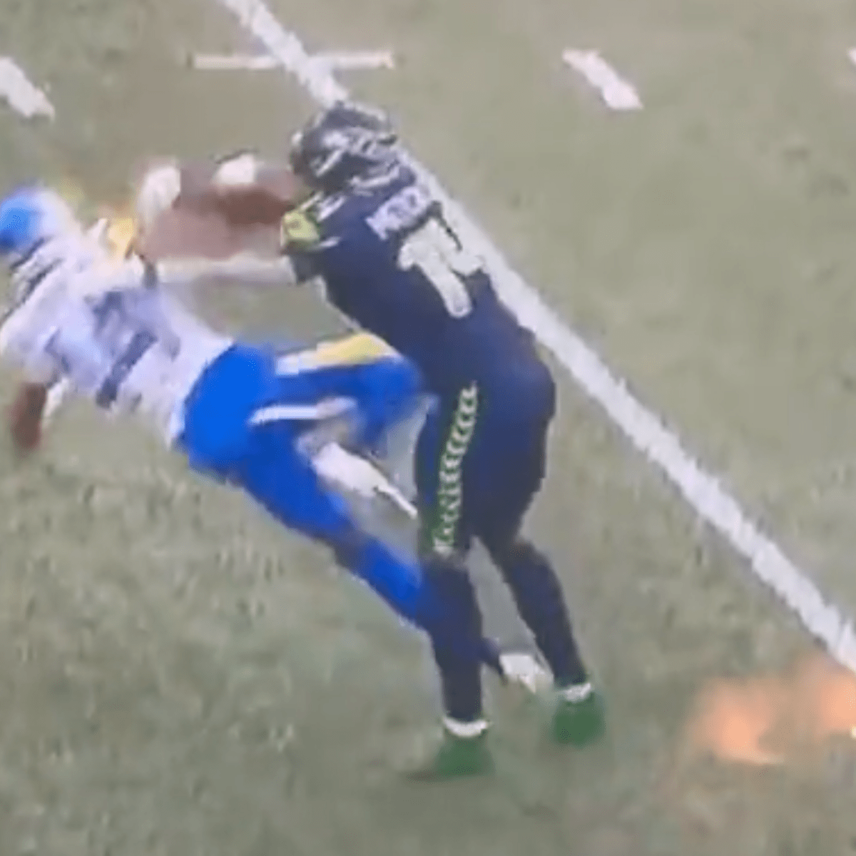 Seattle Seahawks star DK Metcalf slammed for 'cheap shot' hit on LA Rams  rival caught on live TV by stunned NFL viewers