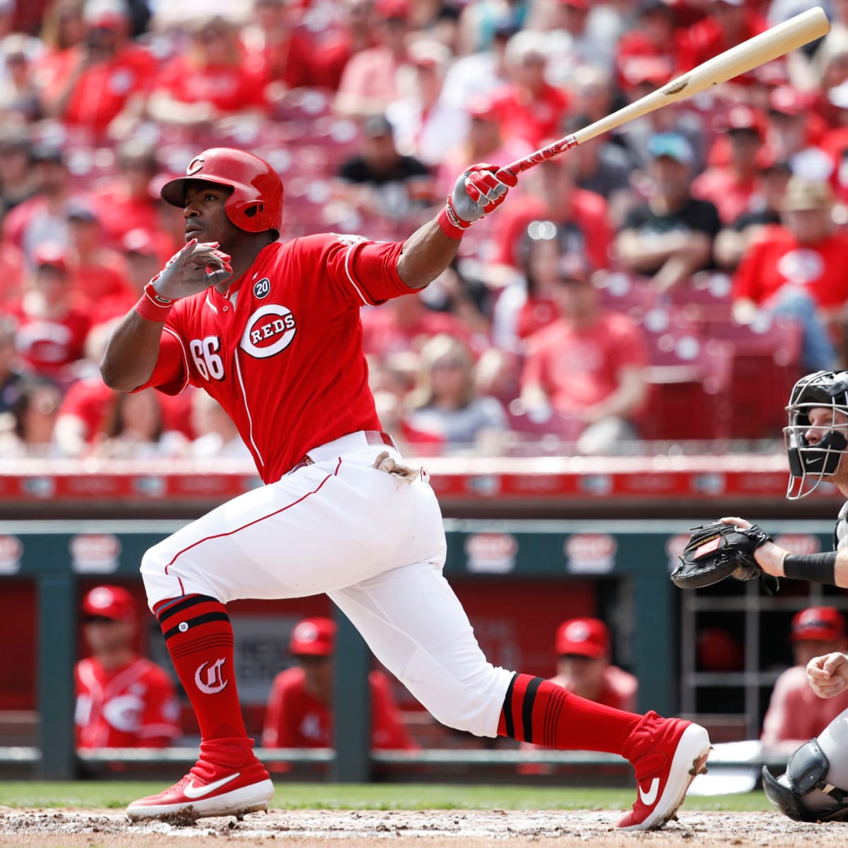 The Reds wore sleeveless throwbacks and Yasiel Puig is looking