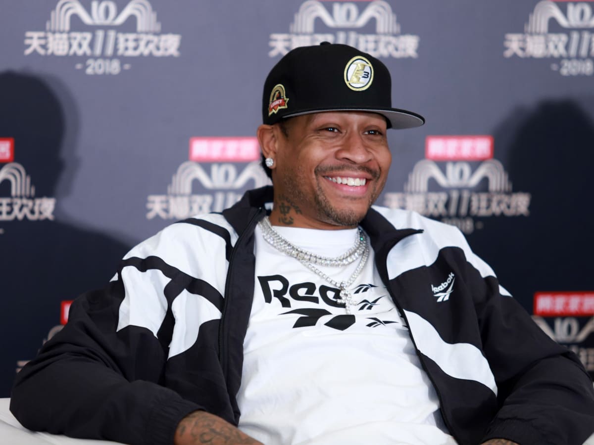 Allen Iverson of the Philadelphia 76ers smiles during the game