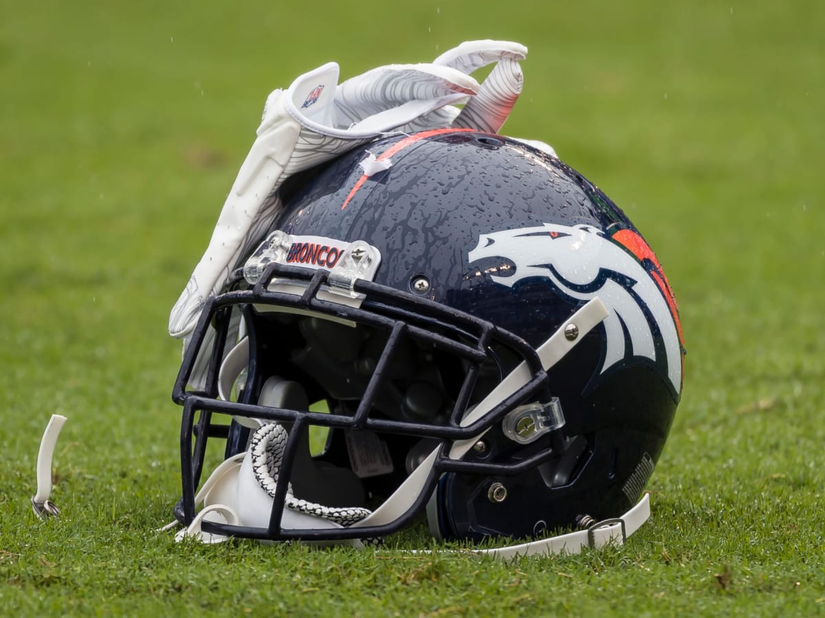 The Denver Broncos alternate helmet is displayed for fans during NFL  Welcome Back festivities at the Broncos' NFL football training camp  Saturday, July 29, 2023, in Centennial, Colo. (AP Photo/David Zalubowski  Stock