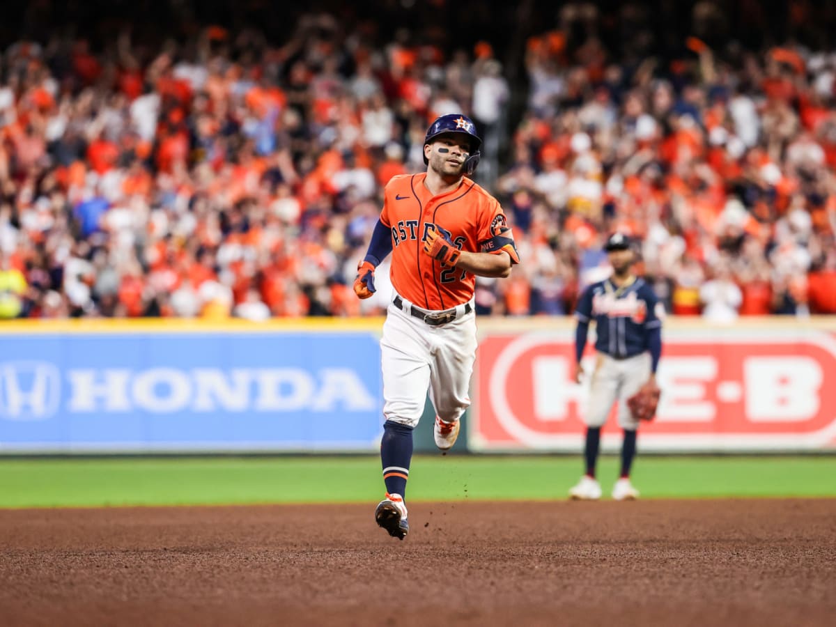 Altuve breaks out with 3 hits as Astros even World Series