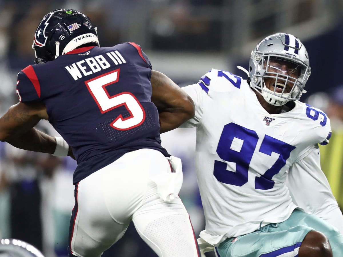 Dallas Cowboys defensive end Taco Charlton (97) walks off the