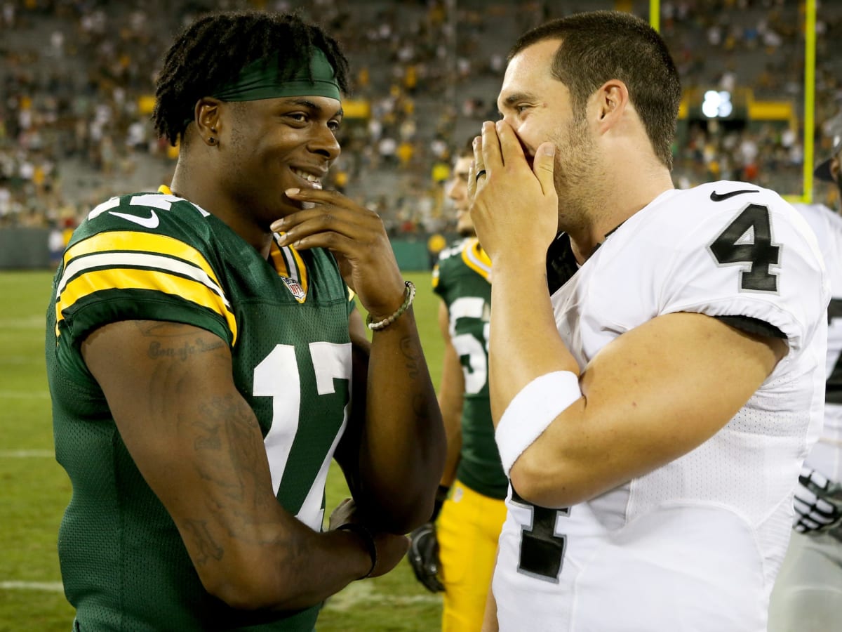 Green Bay Packers quarterback Aaron Rodgers, left, talks with Oakland  Raiders quarterback Derek Carr before an NFL preseason football game in  Oakland, Calif., Friday, Aug. 24, 2018. (AP Photo/Ben …