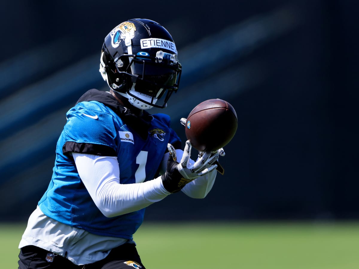 Jags' Etienne completes comeback by getting leveled in camp