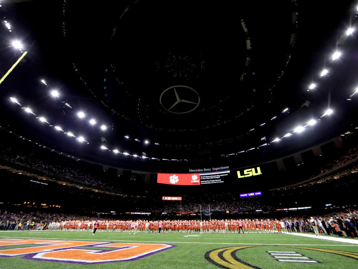 How many fans are at the College Football Playoff Game tonight?