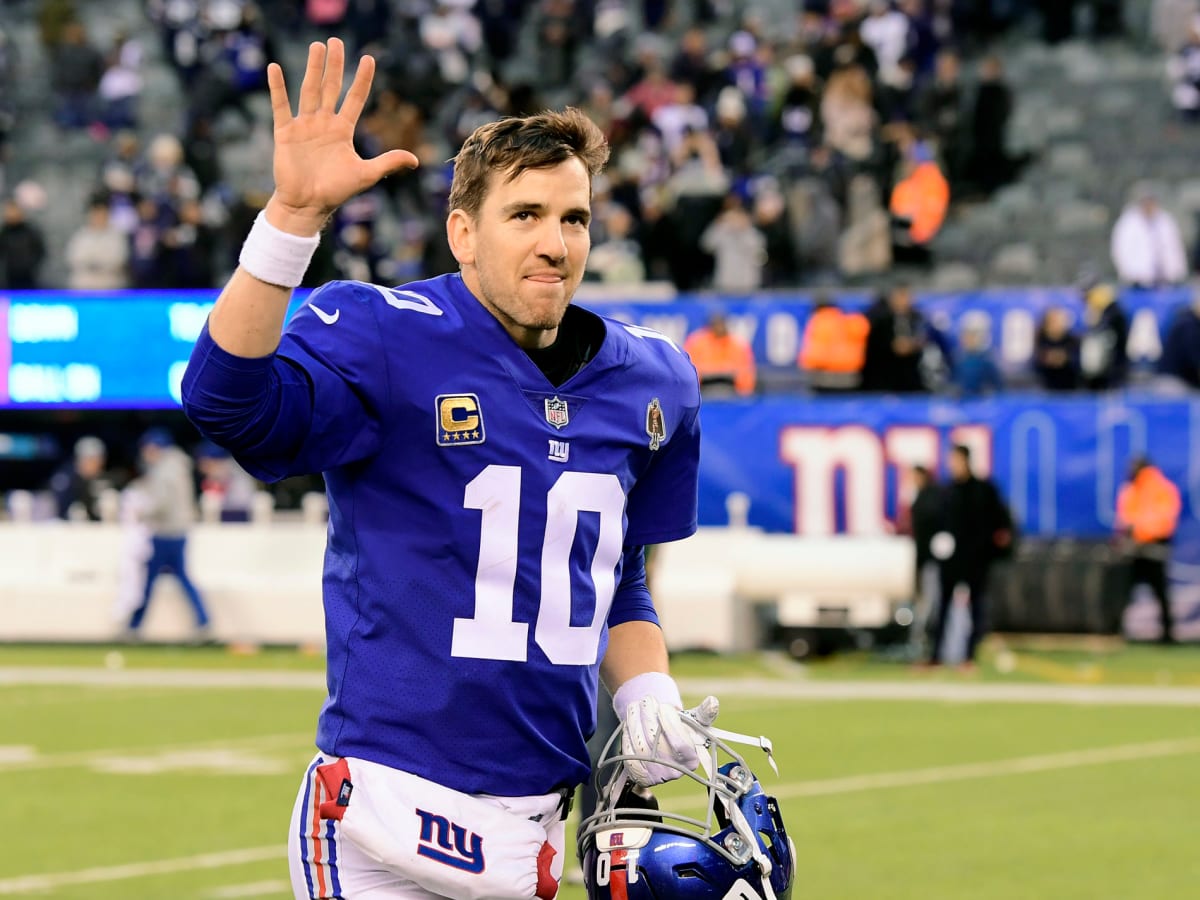 New York Giants quarterback Eli Manning releases a pass in the second  quarter against the Dallas Cowboys at Giants Stadium in East Rutherford,  New Jersey on November 11, 2007. (UPI Photo/John Angelillo