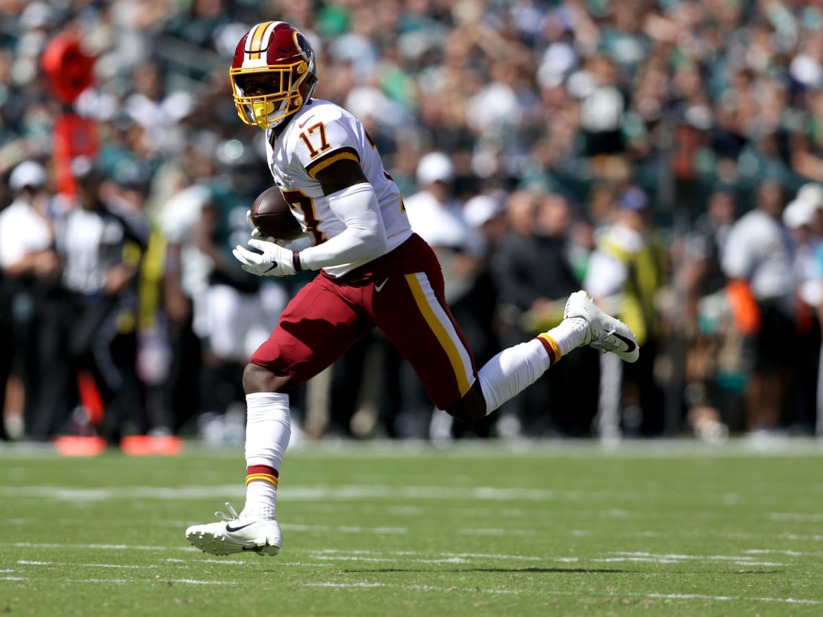 Washington Football Team wide receiver Terry McLaurin (17) spikes