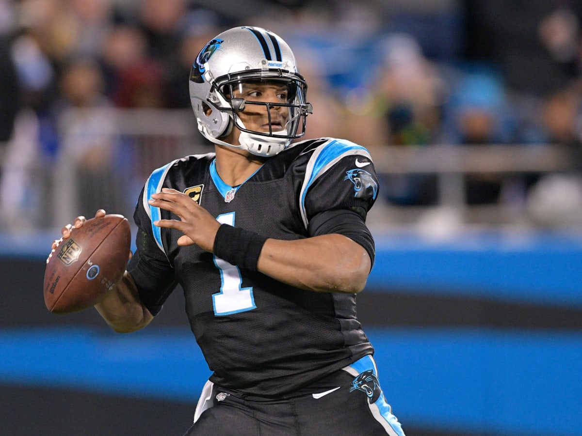 Cam Newton signs with Carolina Panthers. Will he start at QB