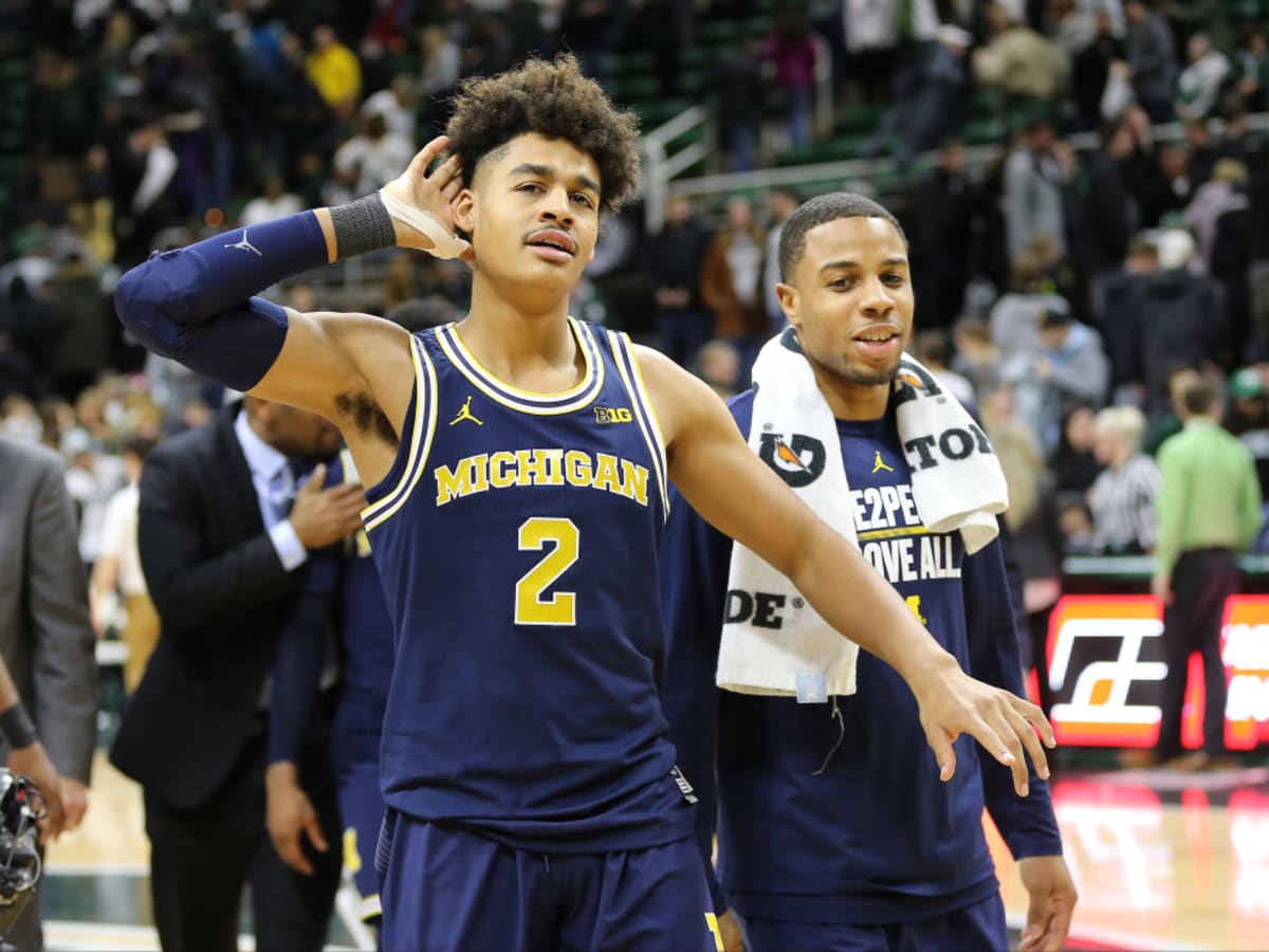 Jordan Poole rocks his Michigan jersey after Warriors' loss to Magic