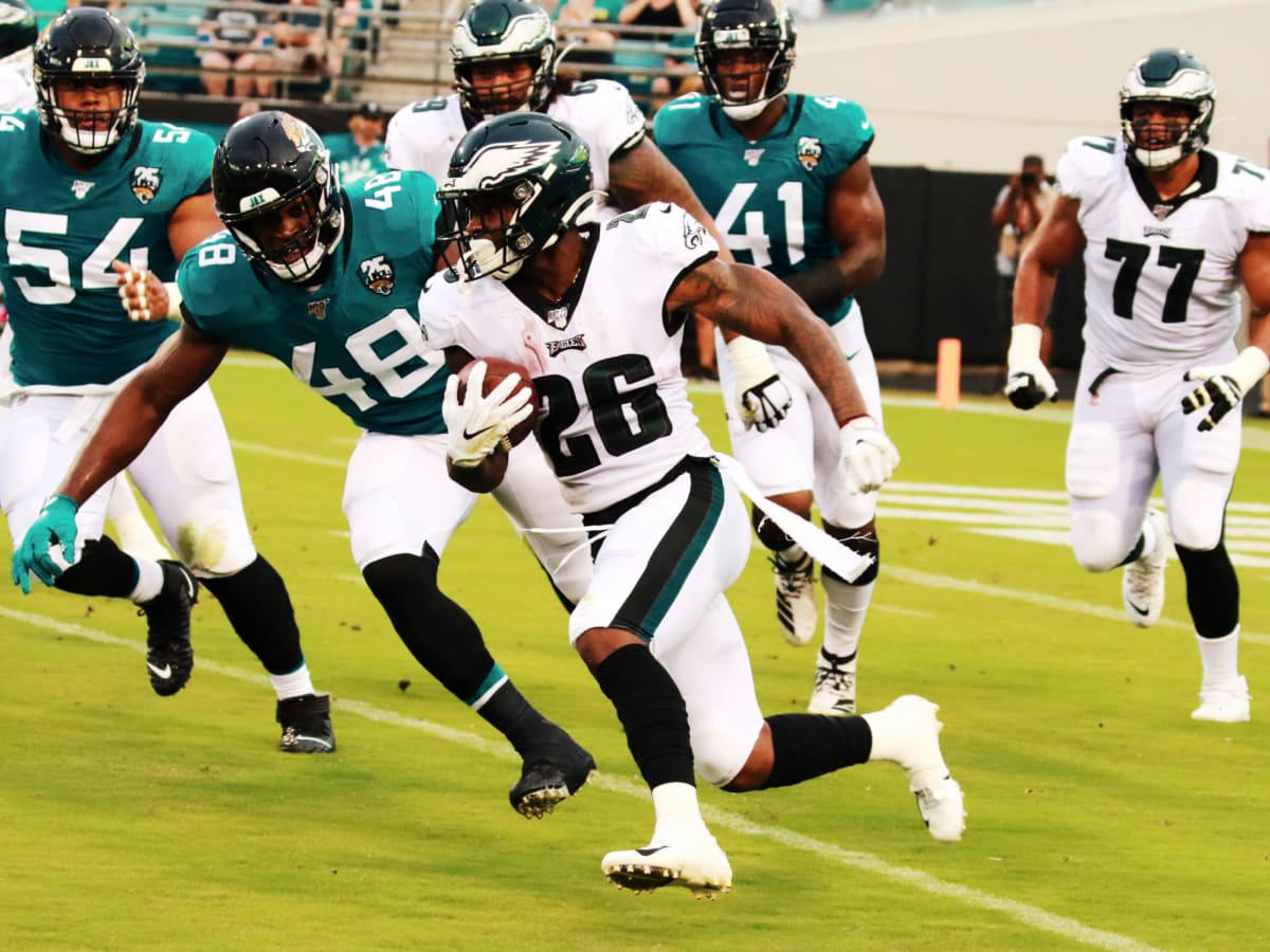 Philadelphia, Pennsylvania, USA. 21st Dec, 2021. Philadelphia Eagles  running back Miles Sanders (26) runs with the ball during the NFL game  between the Washington Football Team and the Philadelphia Eagles at Lincoln